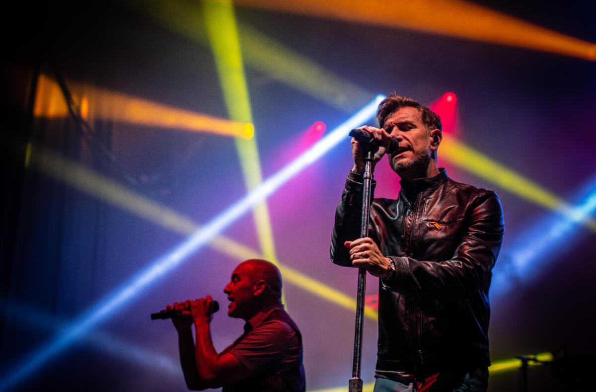Nick Hexum and SA Martinez of 311 perform a hometown show in Omaha at the Shadow Ridge Music Festival.