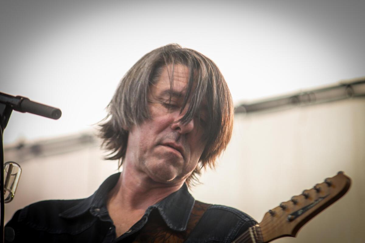 Mike Cooley of Drive-By Truckers performs at Maha Festival at Stinson Park in Omaha, Neb.