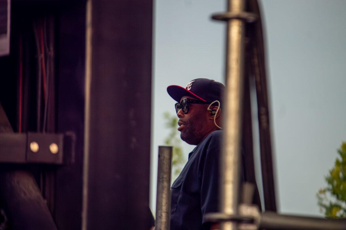 Rapper Killer Mike waits in the wings to take the stage at Maha Festival 2026 in Omaha.