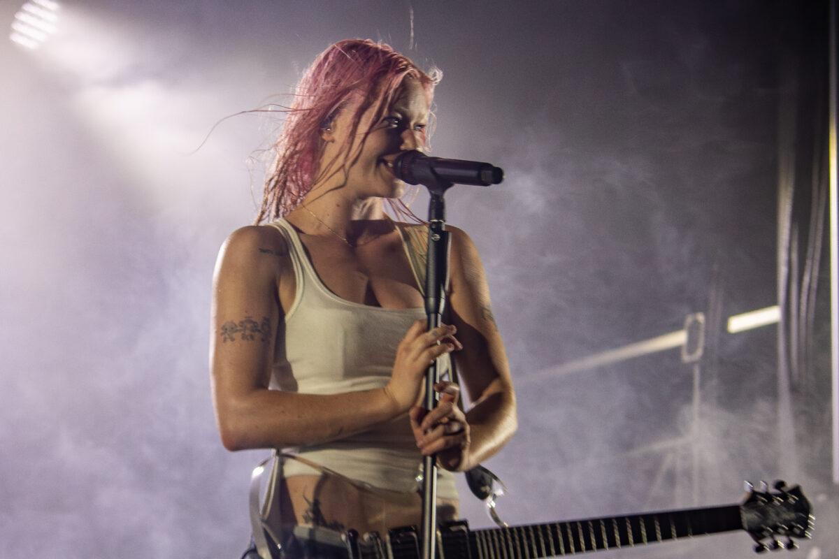Wet Leg's Rhian Teasdale performs with the UK indie rock band at Maha Festival 2026 in Omaha.