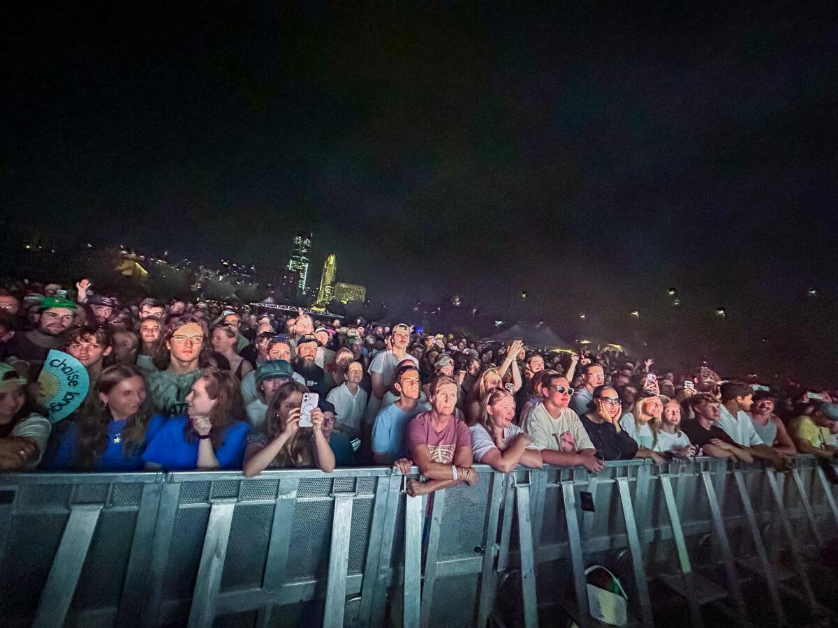 With the Omaha skyline in the background, the crowd stands in awe of Wet Leg at Maha Festival 2026 in Omaha.